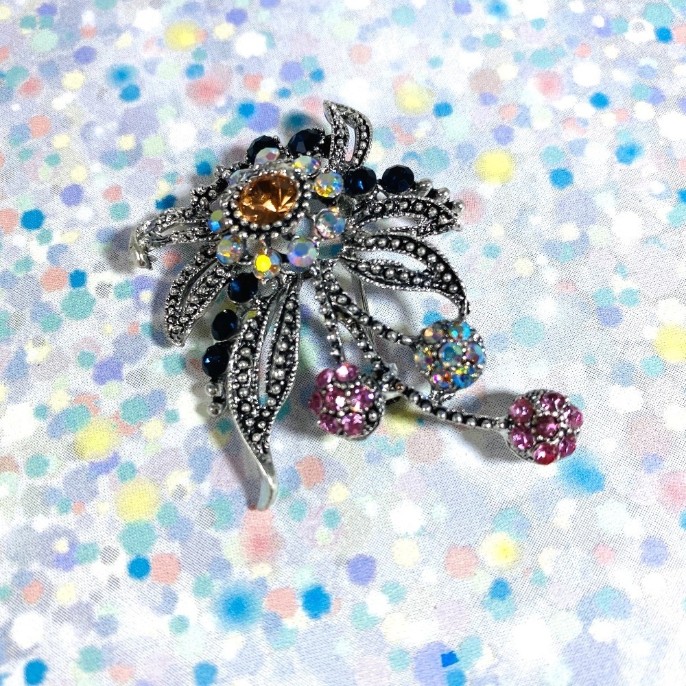 Beautiful pastel silver tone rhinestone flower spray pin